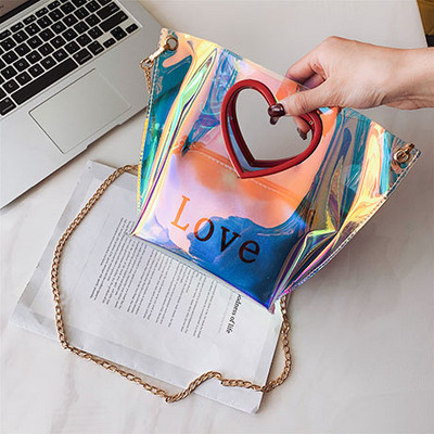 Σύγχρονη γυναικεία τσάντα και μακρύ μεταλλικό αλυσίδα