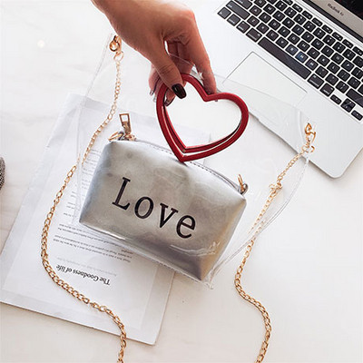 Σύγχρονη γυναικεία τσάντα και μακρύ μεταλλικό αλυσίδα