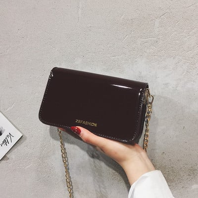 Modern mini női táska négy színben lakkozott eco bőrből, hosszú fémlánccal