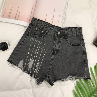 Modern női rövid farmernadrág két színben kövekkel, szakadt motívumokkal