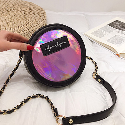 Σύγχρονη γυναικεία τσάντα με κυκλικό σχήμα σε χρώματα που ρέουν με μεταλλική αλυσίδα