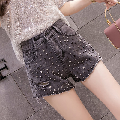 Blugi moderni de dama in albastru si negru cu pietre si motive rupte