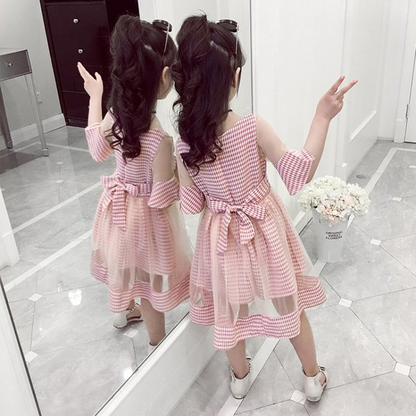 Gyermekruha két színben, rövid ujjal és gombbal