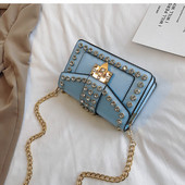 Κομψή γυναικεία έκο δερμάτινη τσάντα σε έξι χρώματα με μεταλλικό κούμπωμα και πέτρες