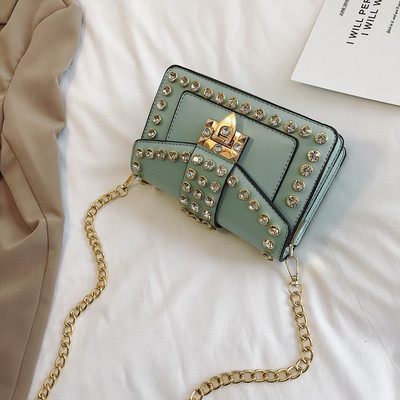 Κομψή γυναικεία έκο δερμάτινη τσάντα σε έξι χρώματα με μεταλλικό κούμπωμα και πέτρες