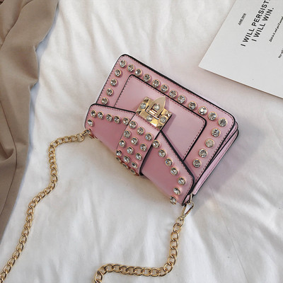 Κομψή γυναικεία έκο δερμάτινη τσάντα σε έξι χρώματα με μεταλλικό κούμπωμα και πέτρες