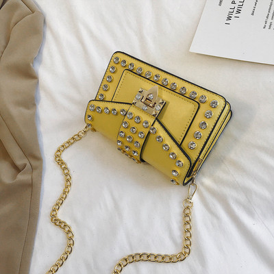 Κομψή γυναικεία έκο δερμάτινη τσάντα σε έξι χρώματα με μεταλλικό κούμπωμα και πέτρες