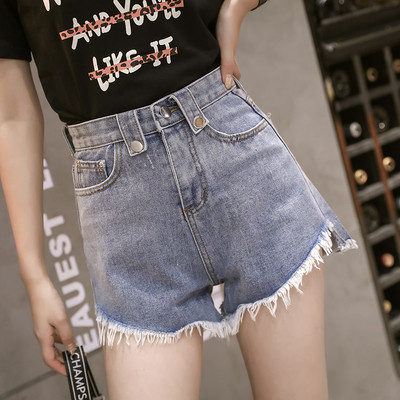 Modern női farmer rövidnadrág szakadt motívumokkal