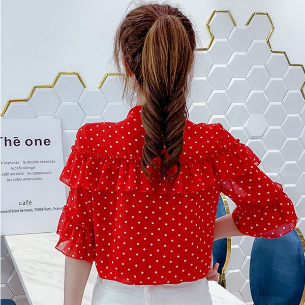 Modern női pöttyös blúz fehér és piros színben