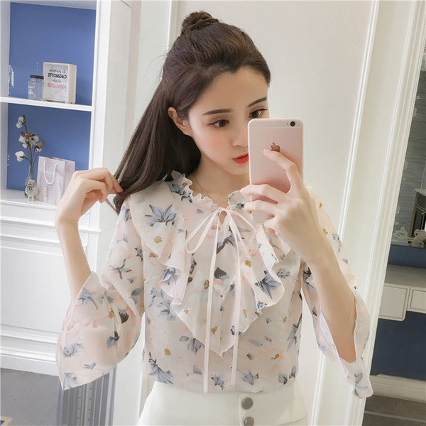 Bluză de damă modernă cu motive florale în alb și negru