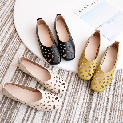 Ανοιξιάτικα γυναικεία παπούτσια με κομμένα σημεία σε μαύρο, λευκό και κίτρινο χρώμα