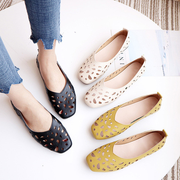 Ανοιξιάτικα γυναικεία παπούτσια με κομμένα σημεία σε μαύρο, λευκό και κίτρινο χρώμα