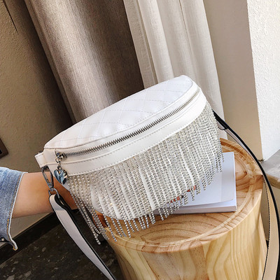 Μοντέρνα γυναικεία τσάντα σε δύο χρώματα απο έκο δέρμα με τριαστάδια μεταλλικά στοιχεία