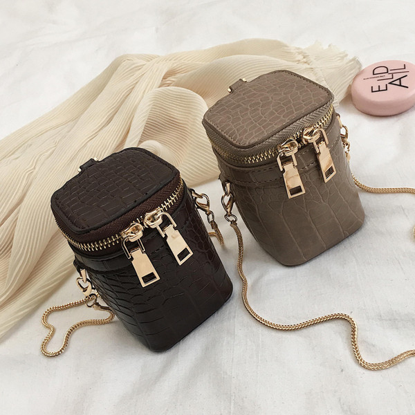 Modern mini női táska öko bőrből négy színben fém lánccal