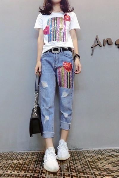 Aktuális női szett két részből - póló és farmer elemmel - flitterekkel