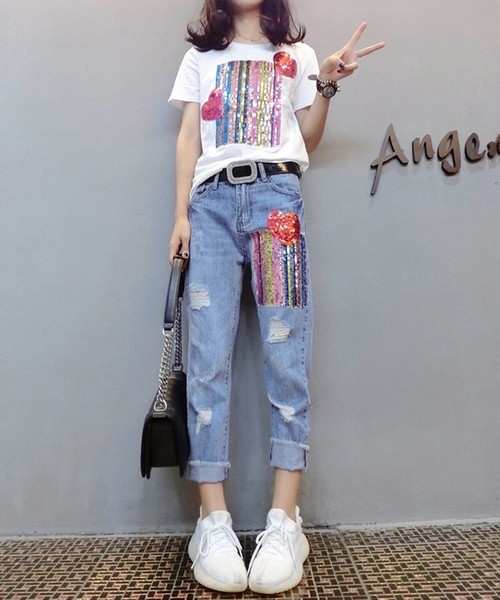 Aktuális női szett két részből - póló és farmer elemmel - flitterekkel