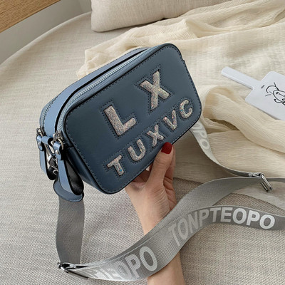 Μοντέρνηα γυναικεία έκο δερμάτινη τσάντα σε πέντε χρώματα με λαμπερά στοιχεία και μεγάλη λαβή