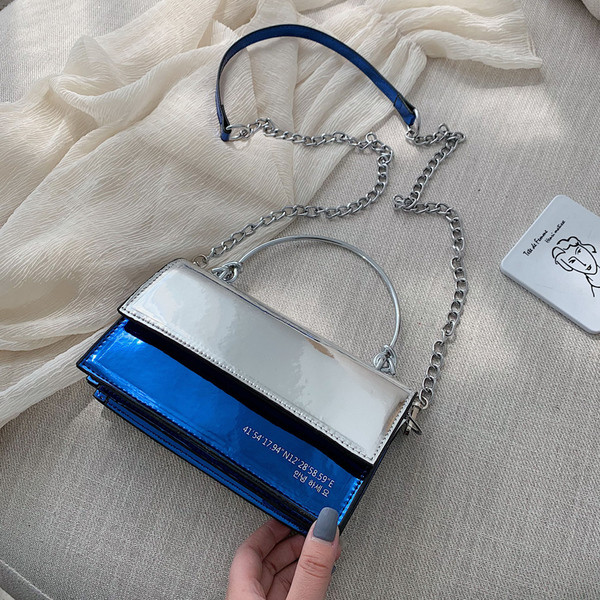 Geanta de mana moderna din piele lacuita in patru culori cu maner scurt si lung