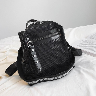 Modern női hátizsák öko bőrből fényes elemekkel fekete színben két modell