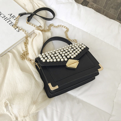 Modern női műbőr négy színben, dekorgyöngyökkel és fém rögzítéssel