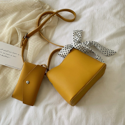 Μοντέρνα γυναικεία τσάντα  με  πορτοφόλη από  οικολογικό δέρμα σε πέντε χρώματα