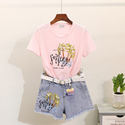 Μοντέρνο γυναικείο σετ -  μπλουζάκι και  τζιν με πούλιες