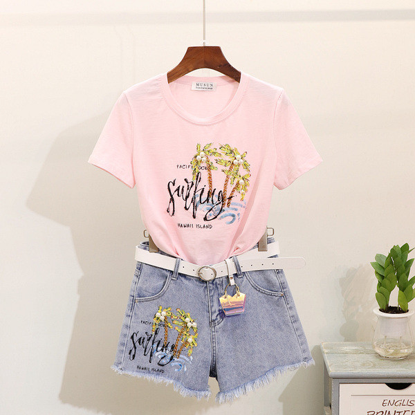 Μοντέρνο γυναικείο σετ -  μπλουζάκι και  τζιν με πούλιες