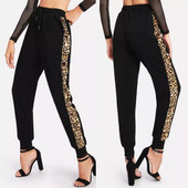 Sport és alkalmi női nadrág fekete színben, leopárd szegéllyel