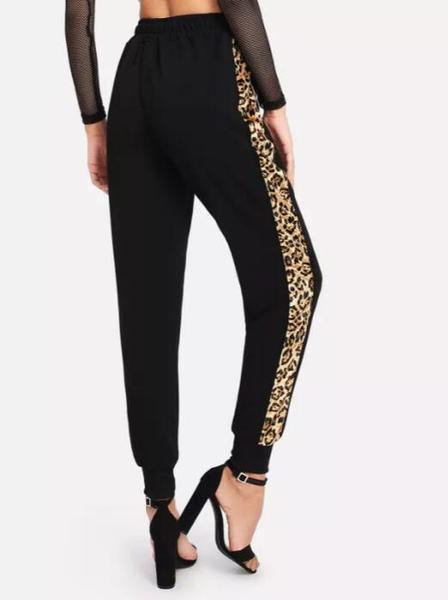 Sport és alkalmi női nadrág fekete színben, leopárd szegéllyel