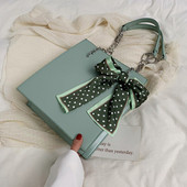 Κομψή γυναικεία έκο δερμάτινη τσάντα  σε τρία χρώματα με κορδέλα