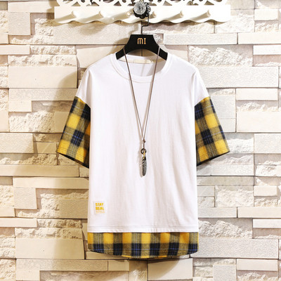 Jelenlegi férfi póló fehér és fekete színben, emblémával