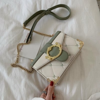 Stílusos kézitáska lánccal több színben