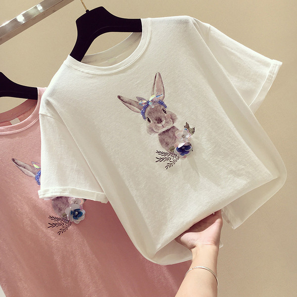 Μοντέρνα γυναικεία μπλούζα με εφαρμογές και τρισδιάστατο στοιχείο σε διάφορα χρώματα