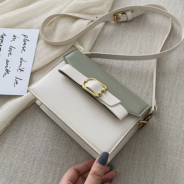 Öko bőrből készült modern női táska négy színben fém elemekkel és hosszú füllel