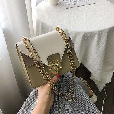 Μοντέρνα γυναικεία  τσάντα  σε τρία χρώματα από οικολογικό δέρμα με μεταλλική στερέωση και μεταλλική αλυσίδα