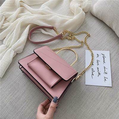 Μοντέρνα γυναικεία έκο δερμάτινη τσάντα σε τρία χρώματα με κοντή και μεγάλη μεταλλική λαβή