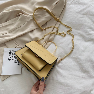 Μοντέρνα γυναικεία έκο δερμάτινη τσάντα σε τρία χρώματα με κοντή και μεγάλη μεταλλική λαβή