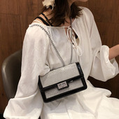 Öko bőrből készült modern női táska fényes elemekkel két színben