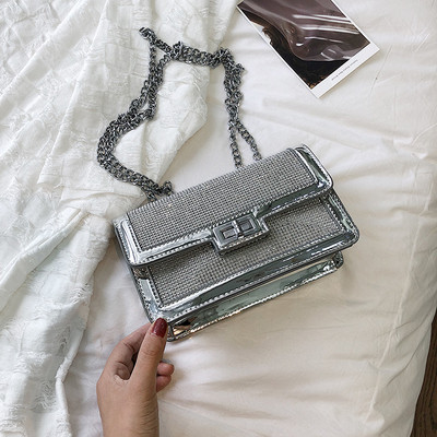 Öko bőrből készült modern női táska fényes elemekkel két színben