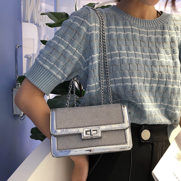 Öko bőrből készült modern női táska fényes elemekkel két színben