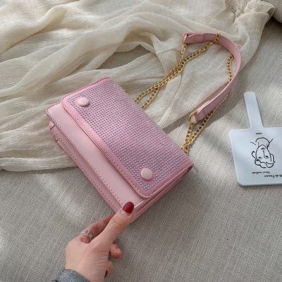 Modern női táska négy színben kövekkel és fémlánccal