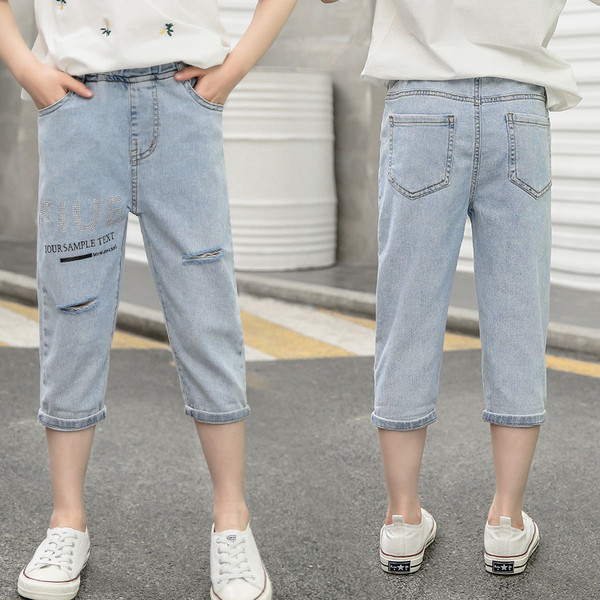 Modern gyerekfarmer szakadt motívumokkal - lányoknak