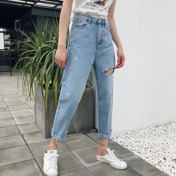 Blugi de dama moderni cu motive rupte si talie inalta