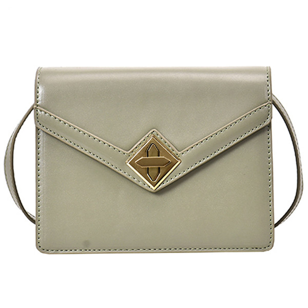 Κομψή γυναικεία έκο δερμάτινη τσάντα σε τέσσερα χρώματα με δισδιάστατη μεταλλική στερέωση