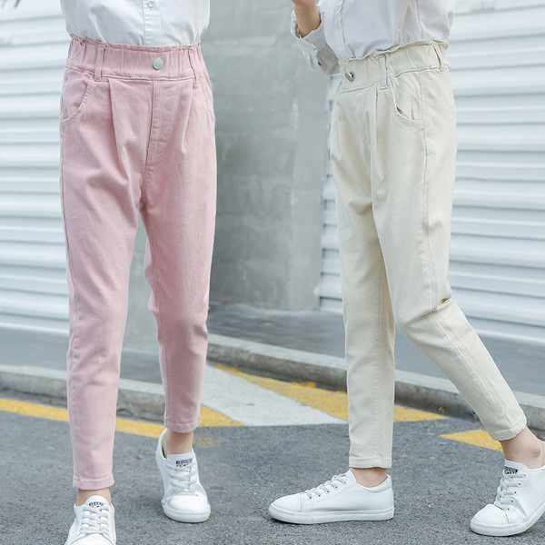 Modern gyereknadrág lányoknak fehér és rózsaszín színben