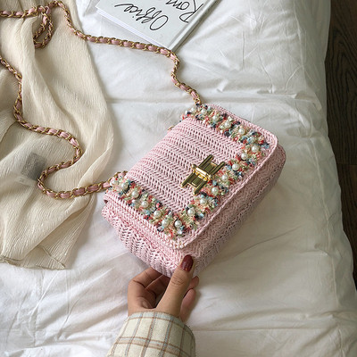 Modern női táska három színben díszgyöngyökkel és fémlánccal