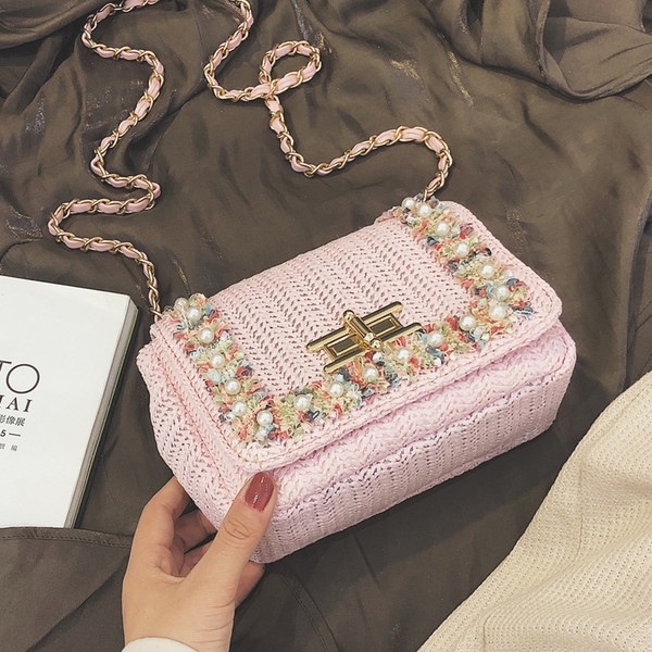 Modern női táska három színben díszgyöngyökkel és fémlánccal