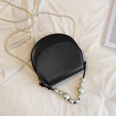 Stílusos női táska eko bőrből négy színben, rövid és hosszú gyöngy fogantyúval két modell