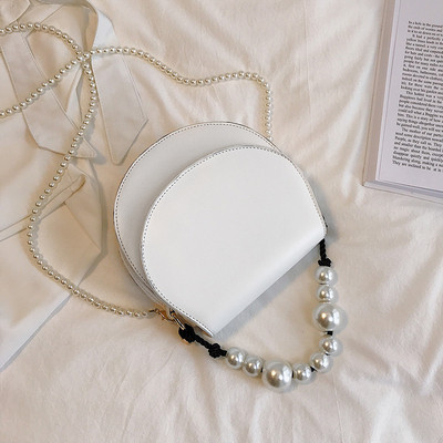 Stílusos női táska eko bőrből négy színben, rövid és hosszú gyöngy fogantyúval két modell