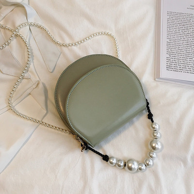 Stílusos női táska eko bőrből négy színben, rövid és hosszú gyöngy fogantyúval két modell